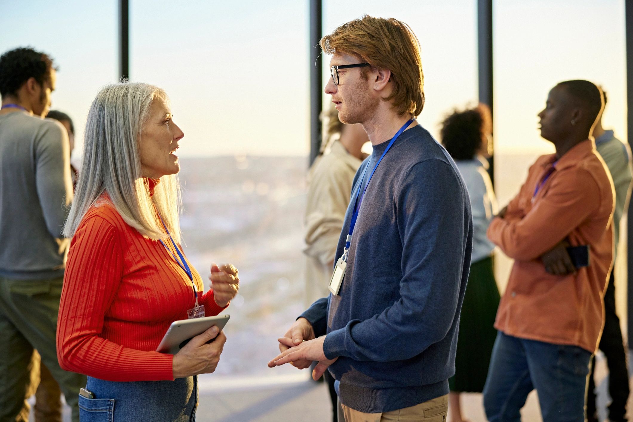 Danish and Australian colleagues in conversation after a meeting