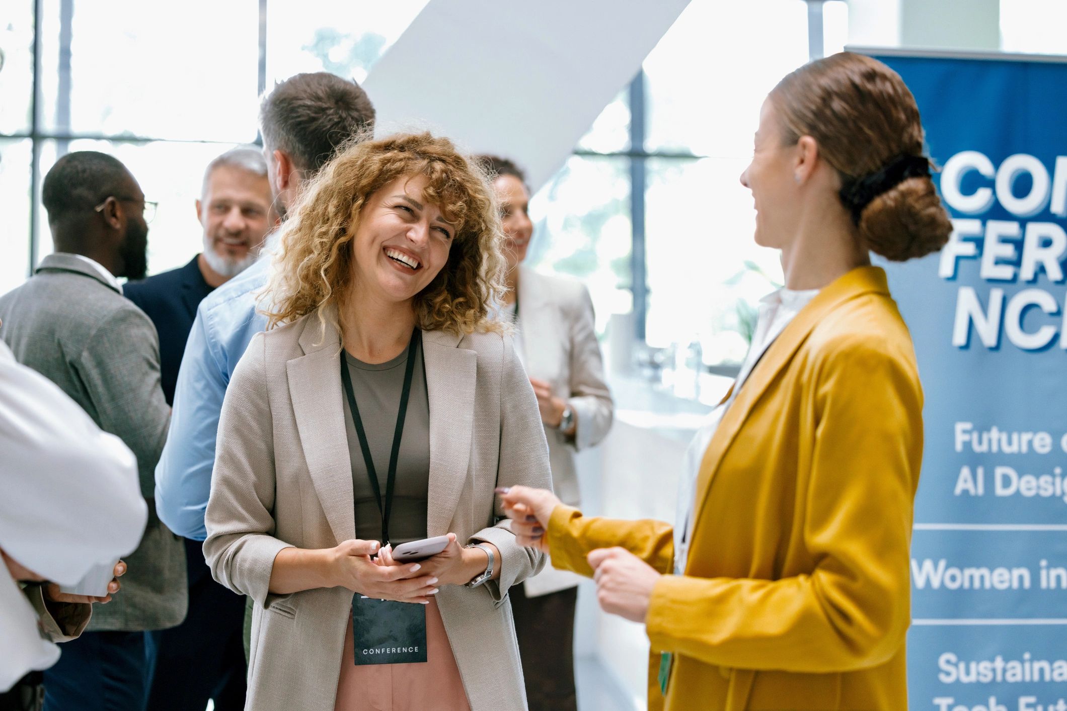 Group of Danish and Australian professionals networking at a chamber event